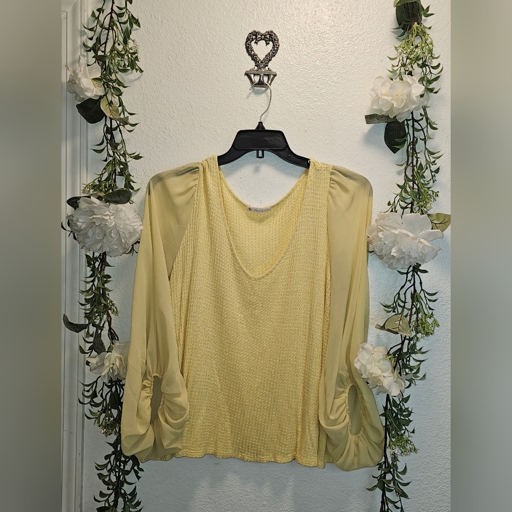 Yellow top with sheer sleeves